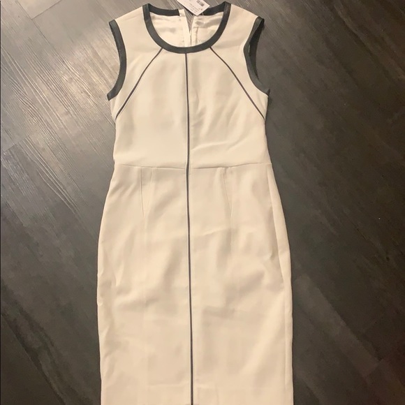 Beautiful white knee length Dress. - Picture 2 of 7